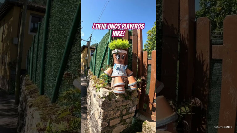 Viajar desde Asturias | 2 de junio de 2024 | Un muñeco hecho con tiestos con unos playeros de marca