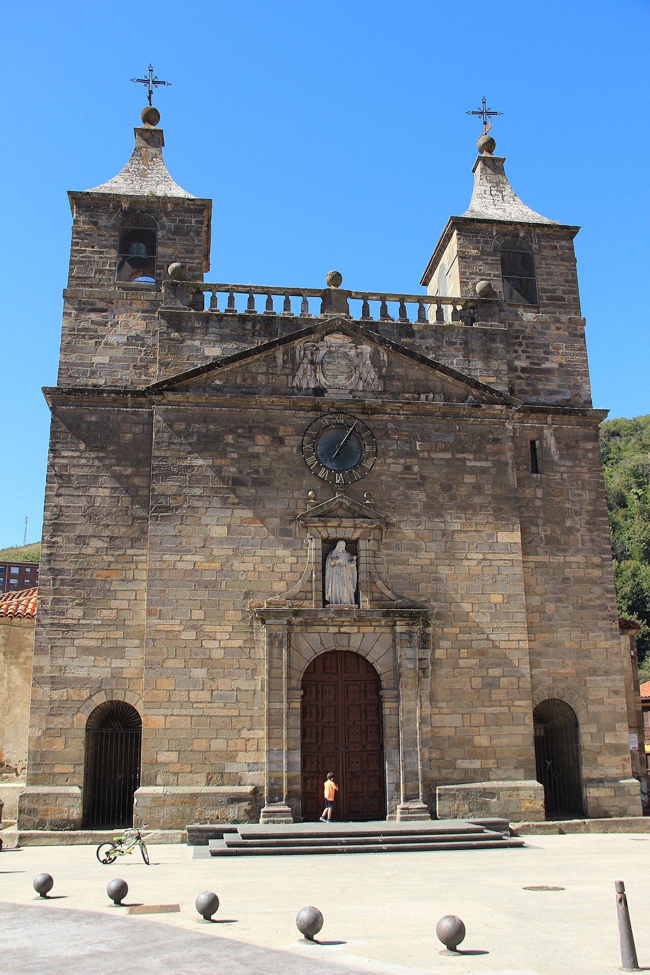 Main façade of the collegiate church of Santa María Magdalena, in Cangas del Narcea